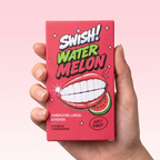 Hand hält SWISH! Watermelon Zahnaufhellungsstreifen